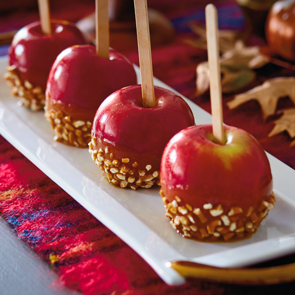 Sweet and Salty Caramel Apples with Pretzel Bottoms