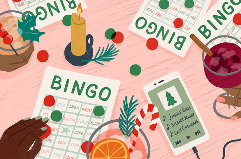 An illustration of Hallmark Channel bingo cards on a table with hands placing markers and holding holiday drinks.