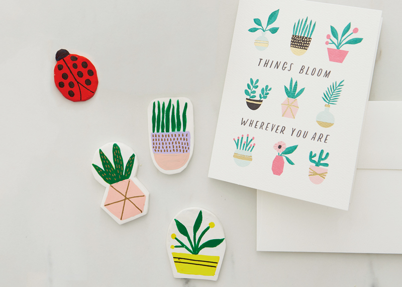 A greeting card featuring illustrations of 9 different potted plants that reads, 