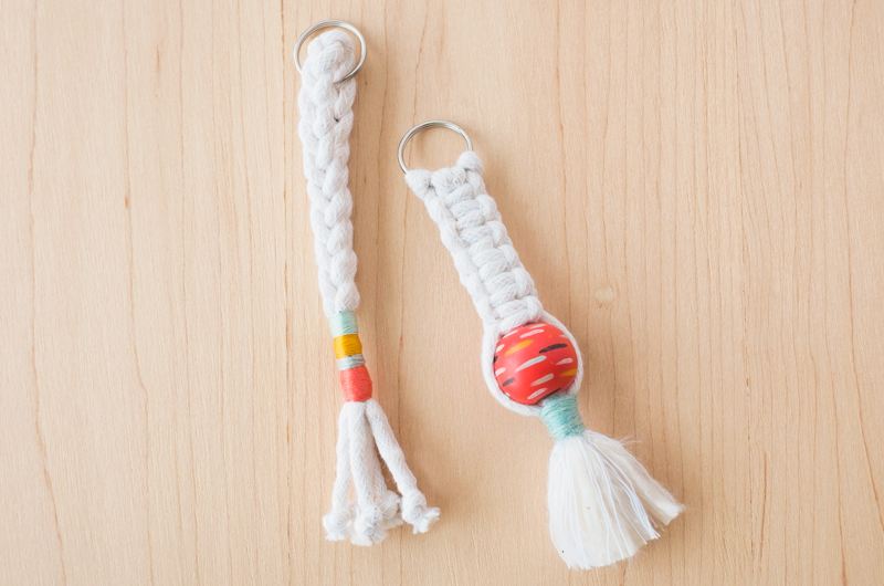 A folded braid macramé keychain and a square knot macramé keychain with bead and short tassel.