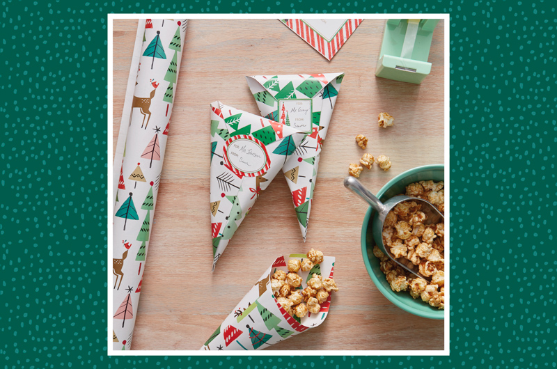 Christmas treat snack cones are a great way to wrap finger foods like caramel corn.