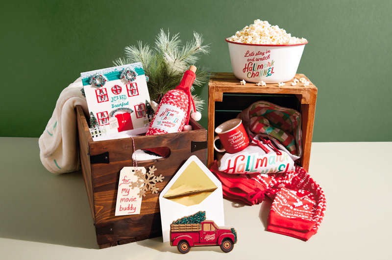 A Hallmark Channel-themed Christmas care package featuring a variety of products.