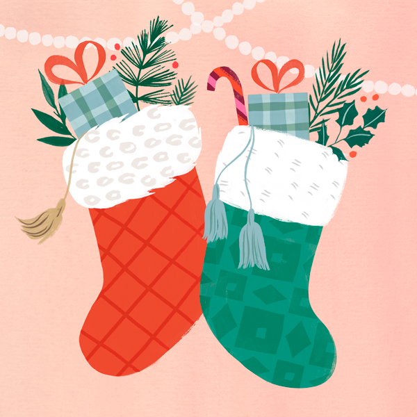 An illustration of two Christmas stockings stuffed with gifts, candy canes and sprigs of holly.