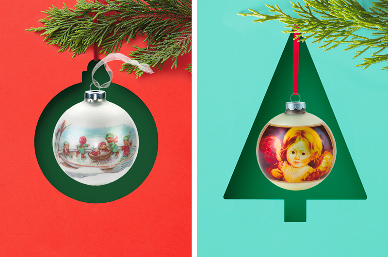 Two vintage Keepsake Ornaments—one a glass ball with a winter scene full of children playing, the other a glass ball with a child-like angel painted on it.