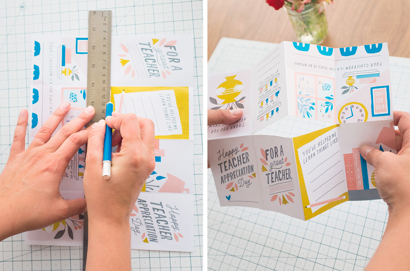 A pair of hands cuts the DIY teacher appreciation printable along the horizontal fold with a craft knife, using a ruler as a guide.
