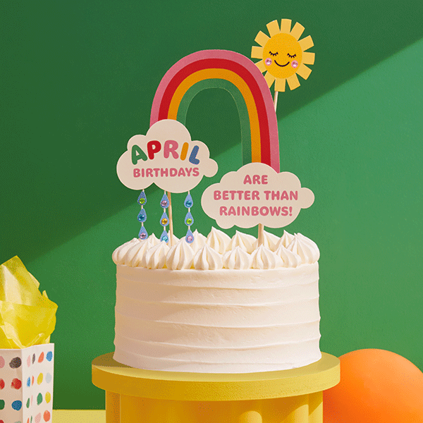 An April birthday cake topper that says, 