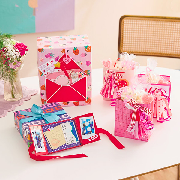 Three different Valentine's Day gift wrap ideas, including gift bag tassels, a ribbon tear unwrapping trick with a treat envelope topper, and a gift card box turned into a mini-memory box.