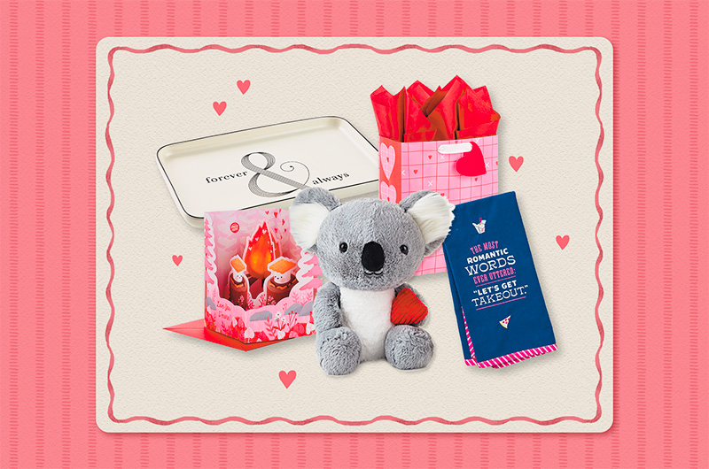 A selection of Valentine's Day gift ideas for her, including a trinket tray that reads, 