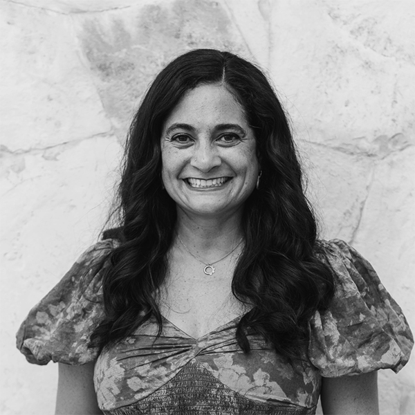 A black and white portrait of DaySpring contributing author Dorina Lazo Gilmore-Young.