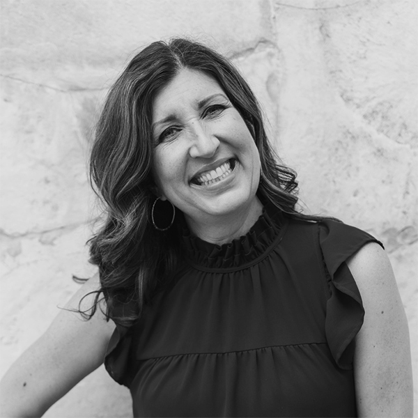 A black and white portrait of DaySpring contributing author Kristen Strong.