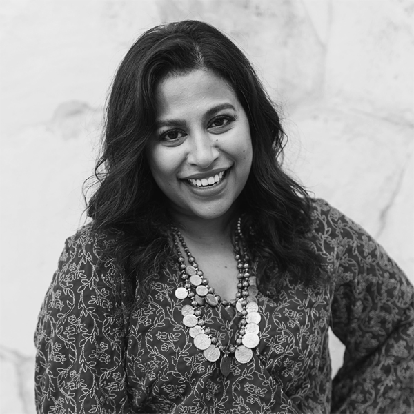 A black and white portrait of DaySpring contributing author Simi John.