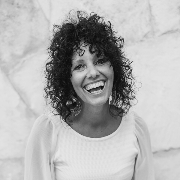 A black and white portrait of DaySpring contributing author Tyra Rains.