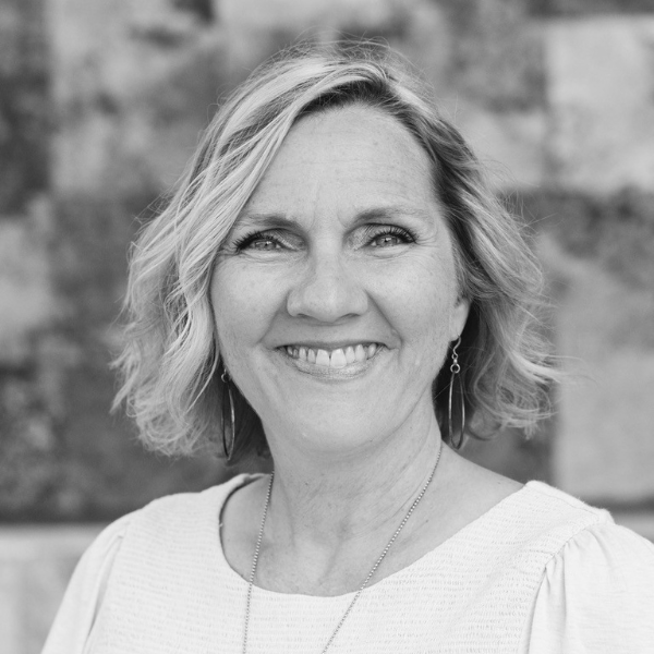 A black and white portrait of DaySpring contributing author Dawn Camp.