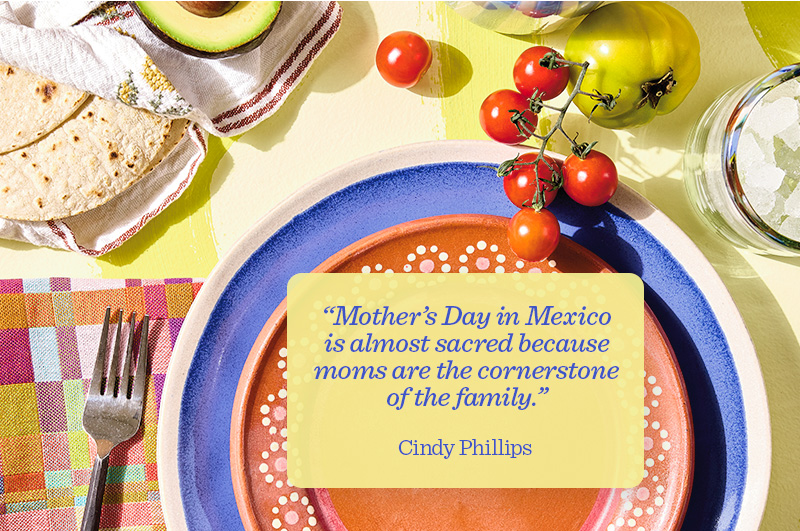 A place setting with brightly colored dinner ware surrounded by foods associated with Mexican cuisine; on top of the plate is a text box with a pull quote attributed to Hallmarker Cindy Phillips that reads, 