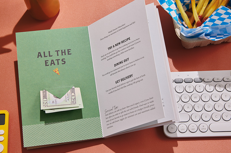 An inside spread of the College Survival Guide book; the left page includes a place to tuck money into, while the right page offers tips for how to spend that money on food, including trying a new recipe, dining out, or getting delivery.