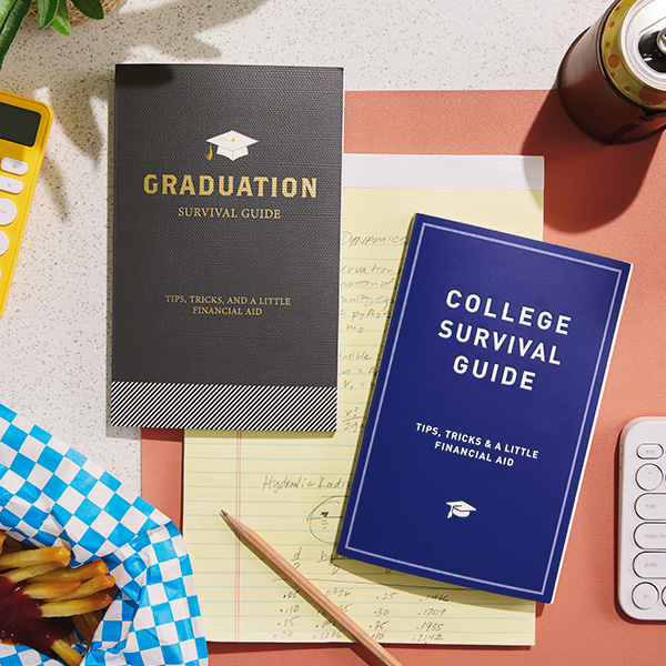 A downshot of two graduation gift books, one titled 