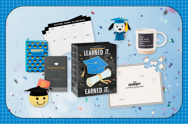 A selection of gifts meant for a recent college graduate with a business or finance major, including a custom puzzle; a notepad of tear-off weekly calendar pages with a heading that reads, 