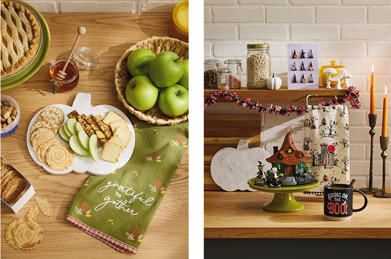 Two home decor setups are positioned side by side; on the left is a kitchen counter decorated for fall, with a white marble-look serving tray shaped like a pumpkin, a green tea towel with the phrase 