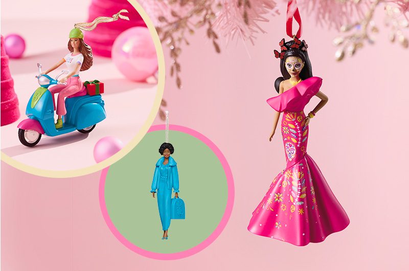 Three Barbie Keepsake Ornaments are collaged together on a pink background, including a Día de Muertos Barbie; a Barbie wearing a bright green helmet and riding a blue motorized scooter; and an African American Barbie in a coordinating bright blue outfit.