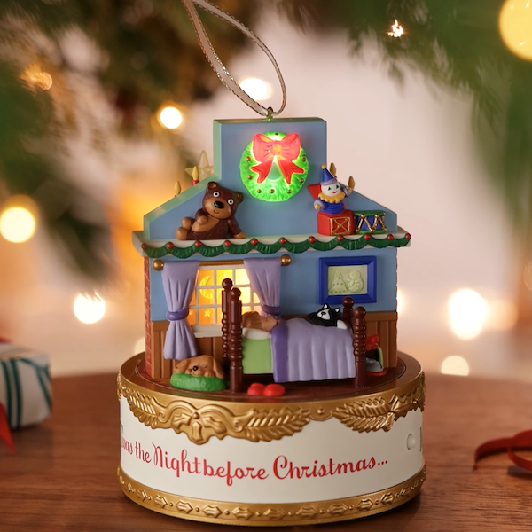 A Keepsake Ornament with light, sound and motion depicts two scenes from the classic poem, 