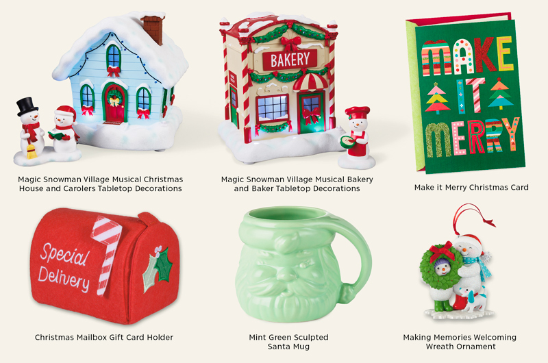Product roundup featuring six Christmas-themed items on a light background: Magic Snowman Village Musical Christmas House and Carolers Tabletop Decorations, Magic Snowman Village Musical Bakery and Baker Tabletop Decorations, Make it Merry Christmas Card with colorful lettering reading “MAKE IT MERRY,” Christmas Mailbox Gift Card Holder with “Special Delivery” text, Mint Green Sculpted Santa Mug, and Making Memories Welcoming Wreath Ornament with a snowman and small animal figures.