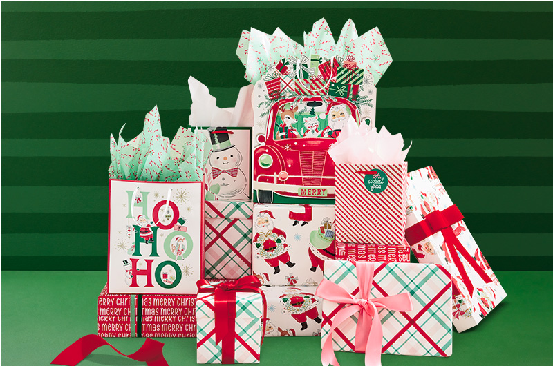 A collection of gift bags and wrapped gift boxes in various vintage-inspired patterns or featuring vintage-inspired icons and characters.